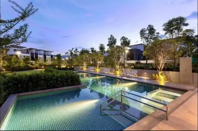 a large swimming pool with lights in a building at Super Friendly TH Laguna Park in Phuket Town
