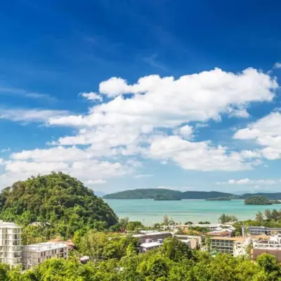 a view of a city and a body of water at Stunning sea view apartment with pool in Ao Nang Beach