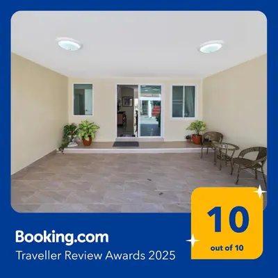 a large empty room with a table and chairs at Spacious Family Garden Villa - Huge Pool & Gym Access in Thalang