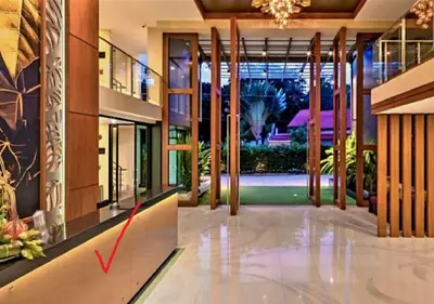 a view of a hallway in a house at Studio Apartment 400m from Rawai Beach in Phuket Town