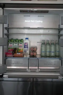 a refrigerator filled with lots of food and drinks at 4bedroom Villa Siray Beach Front in Phuket Town