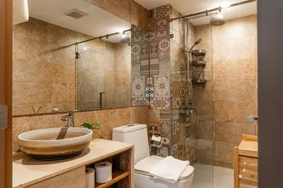 a bathroom with a sink and a toilet at Title V Summer Dream Pool View Gym Hammam in Rawai Beach