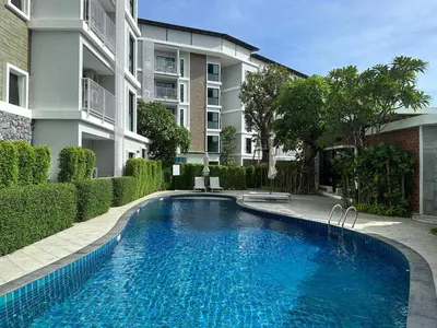 a swimming pool in front of a building at Title V Summer Dream Pool View Gym Hammam in Rawai Beach