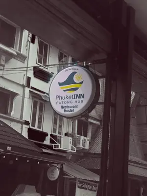 a sign for a puklipimping inc restaurant at Phuket Inn Patong Hub in Patong Beach