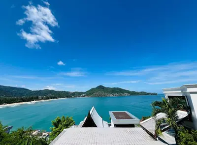a view of the ocean from a house at Moonlight Panorama Seaview House by RESAVA in Surin Beach