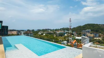 a swimming pool on the roof of a building at Apartment 2 bedrooms on Surin in Surin Beach