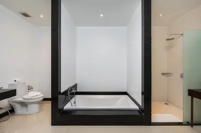 a bathroom with a bath tub and a toilet at Villa Laut 3BR Private Pool 10 min to Nai Harn in Rawai Beach