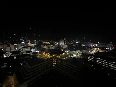 a view of a city at night with lights at Patong Tower Apartment - AMP in Patong Beach