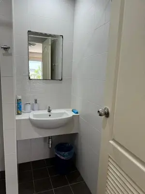 a bathroom with a sink and a mirror at Apartments Kata Beach view garden in Kata Beach