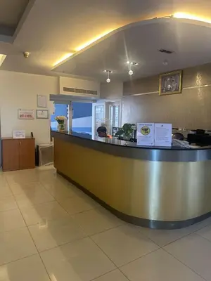 a lobby with a large counter in a hospital at Apartment in Patong Tower in Patong Beach