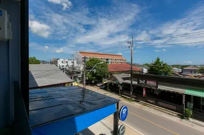 a view of a city street from a bus at Wow Academy & Stay Soi Tai-Aed 2B in Ban Suan