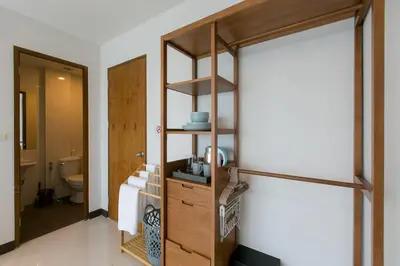 a bathroom with a sink and a toilet in a room at Wow Academy & Stay Soi Tai-Aed 3A in Ban Suan