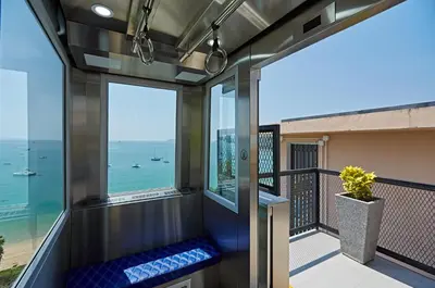 a balcony with a view of the ocean at Bandara Pool Villas, Phuket in Panwa Beach