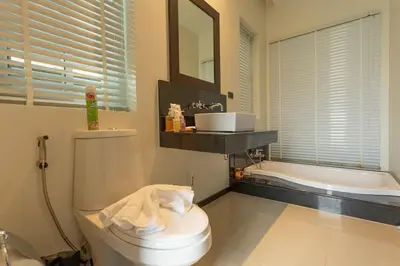 a bathroom with a toilet and a tub and a sink at Oxygen 3BR Walk to Shops, Bars, Private Pool v113 in Rawai Beach