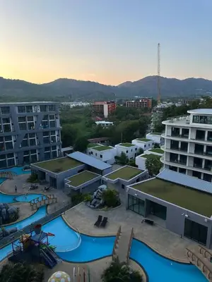 an aerial view of a resort with a water park at Duplex apartment on Naiharn Beach A22 in Rawai Beach