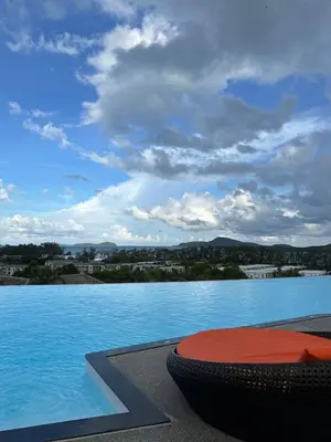 a view of a swimming pool with at Spacious apartment 600m from the beach in Rawai Beach