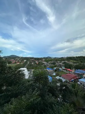 a view of a city with buildings and trees at ReLife The Windy NaiHarn (716) in Ban Saiyuan (1)