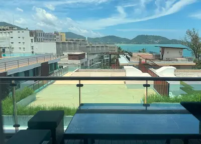 a view from the roof of a building with a pool at Sea view apartment at Privilege by Lofty in Patong Beach