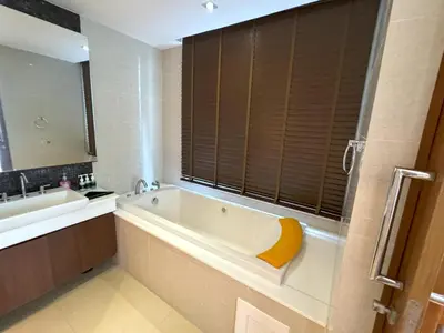 a bathroom with a bath tub and a sink at Sea view apartment at Privilege by Lofty in Patong Beach