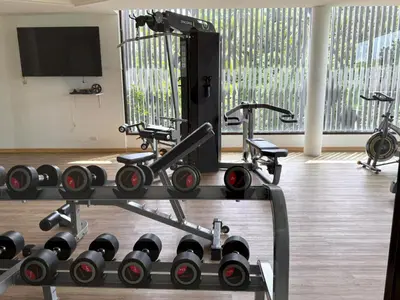 a gym with two exercise bikes on a rack at Sea view apartment at Aristo2 by Lofty in Surin Beach