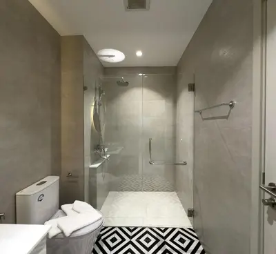 a bathroom with a shower and a toilet at The Title Halo 1 Apartment 10 min to Nai Yang Beach in Nai Yang Beach