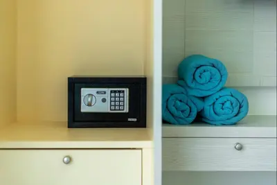 a microwave sitting on top of a counter with blue cookies at Private Villas Bangtao in Bang Tao Beach