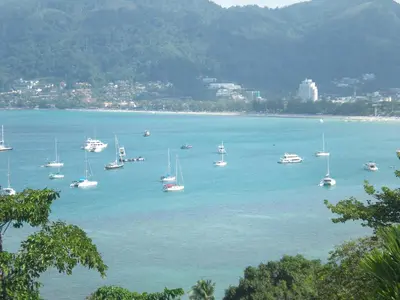 a group of boats in a large body of water at Atika Villas in Patong Beach