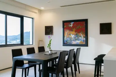 a dining room with a table and chairs at The Heights Penthouse A5 3Bedrooms Seaview near Kata Beach in Kata Beach