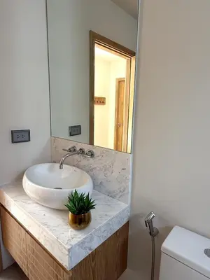 a bathroom with a sink and a mirror at Luxury 3BR Pool Villa near Blue Tree - Bang Tao in Amphoe Kathu