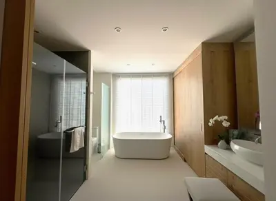 a bathroom with a large tub and two sinks at Luxury 3BR Pool Villa near Blue Tree - Bang Tao in Amphoe Kathu