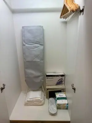 a white closet with a shelf with towels and boxes at คอนโดใกล้หาดในทอนNai Thon Beach Room A410 in Nai Thon Beach