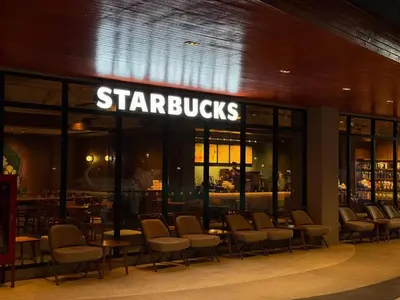 a restaurant with chairs and a sign that reads starbucks at Title V Sunny Nest Sea View 5fl Pool Gym in Rawai Beach