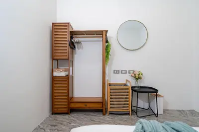 a room with a closet with a mirror and a table at Stylish Pool Villa in Chalong-Phuket-2 Bedroom in Ban Suan