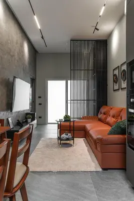 a living room with a couch and a table at The Rich Villas House Pool Chalong Robinson in Ban Suan