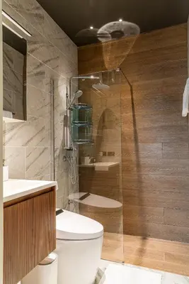 a bathroom with a toilet and a glass shower at The Rich Villas House Pool Chalong Robinson in Ban Suan