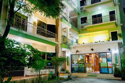 a building with a store in front of it at RK Guesthouse in Patong Beach