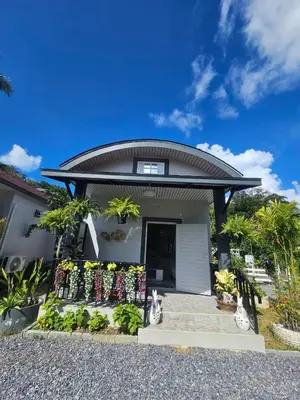 a small house with a round roof at Tropical Oasis Aoyon Beach House in Ban Ao Makham