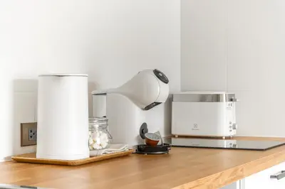 a kitchen counter with a blender and a coffee maker at Title Halo Timeless Naiyang Pool Gym Sauna in Nai Yang Beach