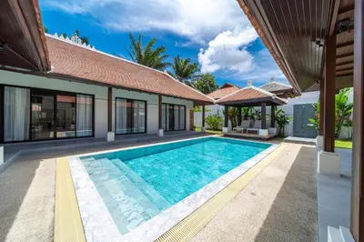 an image of a swimming pool in a villa at Luxury 4 Bedrooms 800 square meters of large space Private swimming pool private kitchen service Family and friends vacation in Bang Tao Beach