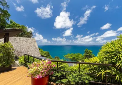 a balcony with a view of the ocean at Villa Yin, Private Oceanfront Villa, Kamala Beach in Kamala Beach