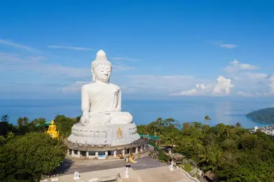 a large white statue in front of the ocean at XX Bao Patong Beach PHUKET เบา หาดป่าตอง ภูเก็ต in Patong Beach
