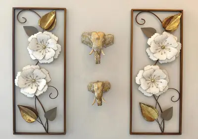 four pictures of flowers and an elephant on a wall at Bangtao Luxury Pool Villa - PrymaVerde in Laguna Phuket