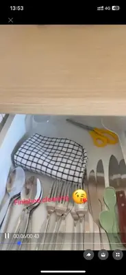a drawer filled with utensils in a refrigerator at Rawai beach condominium \u62c9\u8587\u6d77\u6ee9\u9152\u5e97\u516c\u5bd3 in Nai Harn Beach