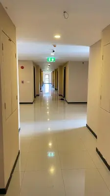 an empty hallway of an office building at Rawai beach condominium \u62c9\u8587\u6d77\u6ee9\u9152\u5e97\u516c\u5bd3 in Nai Harn Beach