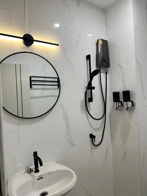 a bathroom with a mirror and a sink at Jong's House- Phi Phi Island in Phi Phi Don