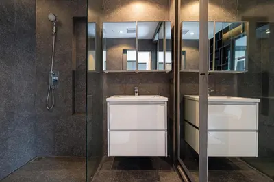 a bathroom with a sink and a shower at Your Relaxing Stay! Suite CTG P506 at Tropics Kamala Residence with Scenic Rooftop Pool and Great Amenities in Kamala Beach