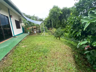 a yard of a house with a tent in it at Green House 2 in Ban Na Nai