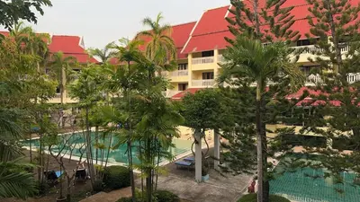 an aerial view of a resort with a pool and palm trees at Successive BeachFront ,Krabi in Ban Khlong Haeng