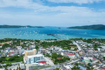 an aerial view of a city and the water at Island Escape 1BR T1-206 in Chalong