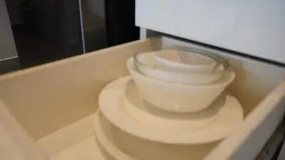 two white bowls are sitting on a shelf at Boutique Comfort 1BR T2-410 in Chalong